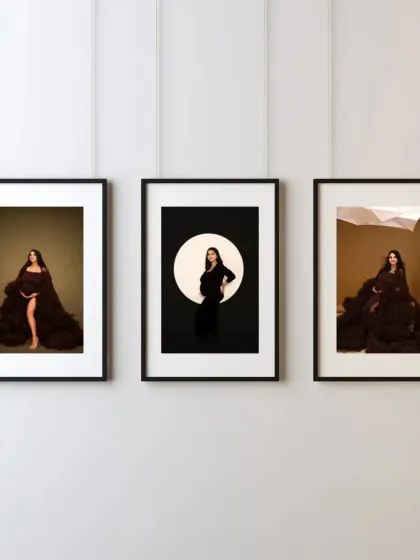 See how your photos can become art for your home. This image shows three beautifully framed maternity portraits hanging on a wall, a perfect way to display your memories.