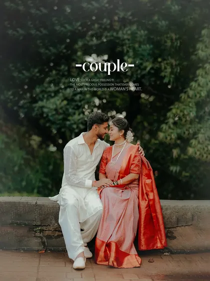 A classic romantic portrait of the engaged couple. The lush green background makes their traditional outfits pop, creating a beautiful and timeless image.