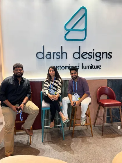 Visitors testing out our custom-made bar stools. We design seating for all heights and purposes, from dining chairs to counter stools.