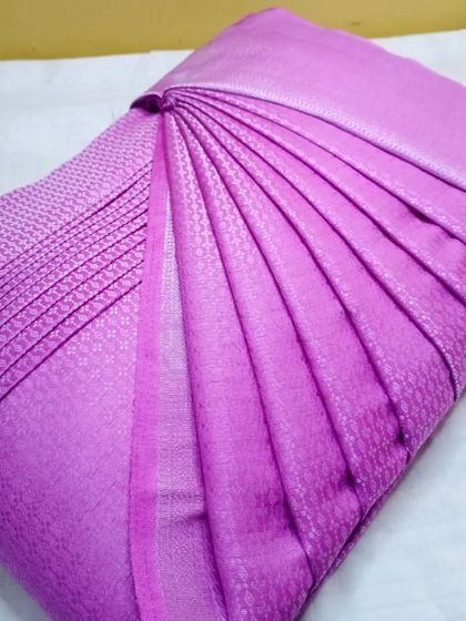A lovely lavender-pink saree, pleated and ready to wear. My service is designed to make you love your sarees all over again.