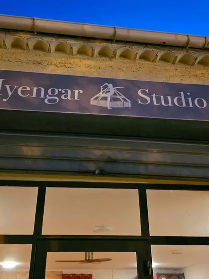 The sign for an Iyengar yoga studio in France.