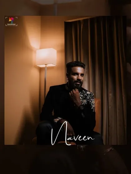 A stylish portrait of the groom, Naveen, for his reception. The warm, soft lighting creates a sophisticated and relaxed mood.