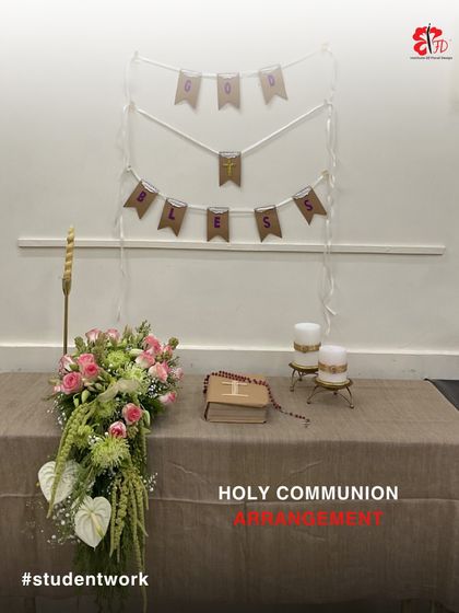 A closer look at the Holy Communion arrangement. The design features a delicate cascade of roses and anthuriums, perfectly complementing the serene and blessed theme of the event.