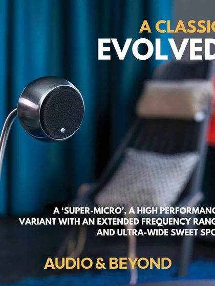 The Gallo Acoustics Micro SE speaker is a classic evolved. This "super-micro" variant, shown here on an elegant floor stand, offers high performance with an extended frequency range and an ultra-wide sweet spot, making it both an auditory and visual centerpiece.