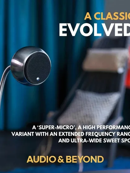 The Gallo Acoustics Micro SE speaker is a classic evolved. This "super-micro" variant, shown here on an elegant floor stand, offers high performance with an extended frequency range and an ultra-wide sweet spot, making it both an auditory and visual centerpiece.