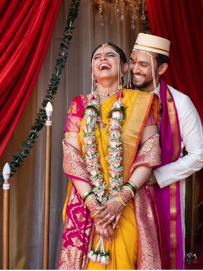 A moment of pure, uninhibited laughter during the wedding ceremony. It’s these flashes of genuine joy that make for the most cherished wedding photographs.