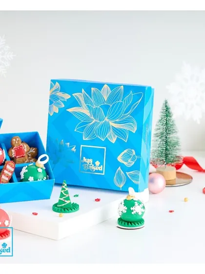 Another version of our Christmas celebration box, this one filled with edible ornaments and gingerbread cookies.