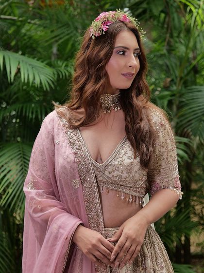 A beautiful shot from a fairytale-themed shoot we collaborated on. The model is wearing one of our pastel lehengas, perfect for a whimsical look.