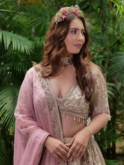 A beautiful shot from a fairytale-themed shoot we collaborated on. The model is wearing one of our pastel lehengas, perfect for a whimsical look.