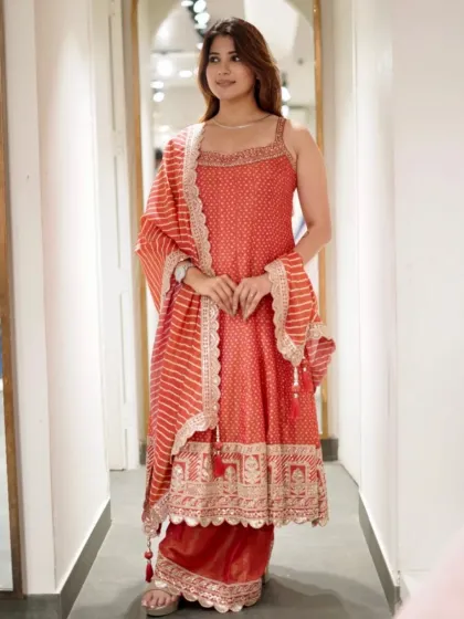This red printed suit set is a pure statement piece, perfect for making an impression.