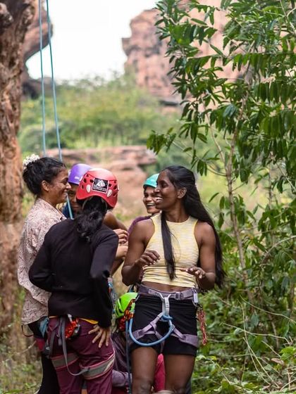 The community spirit extends to our volunteers who help transport and organize gear. Here's our crew having a laugh amidst the gear-sorting chaos.