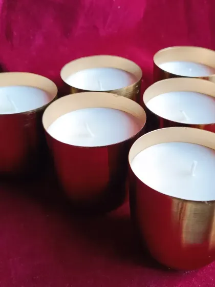 The set of six brass jar candles.
