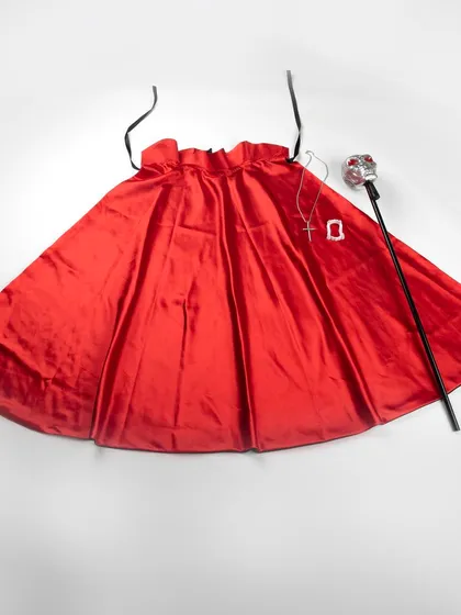 A shot of the red satin Dracula cape spread out.