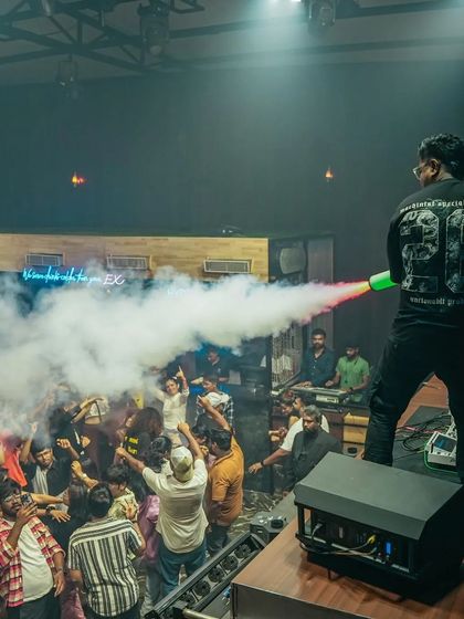 Standing on the console at Hydra to get a better angle with the CO2 gun. I always find ways to get into the crowd and make the party more interactive and visually exciting.