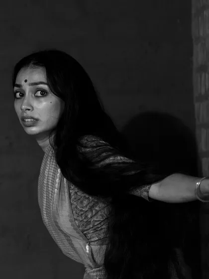 A different angle of the startled expression, highlighting the tension in the eyes and face.
