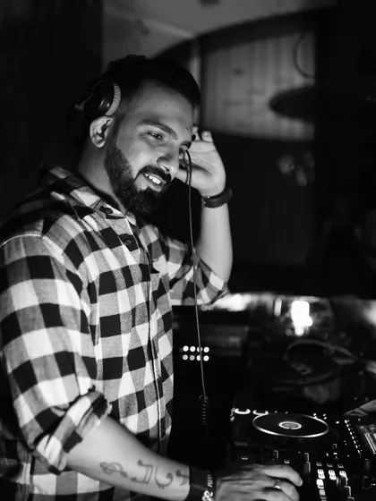 The pictures might be monochromatic, but the night was anything but. Capturing the mood while spinning a set on a Saturday night.