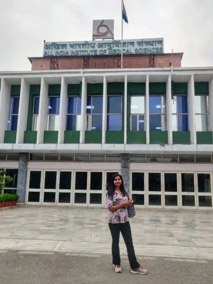 Standing outside the iconic All India Institute of Medical Sciences (AIIMS). My work here as a Yoga Therapist involves integrating yoga into modern healthcare protocols.