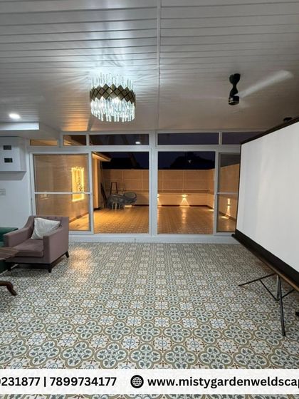 We converted this open terrace at Skylark Greens into a luxurious, fully enclosed room. Featuring a durable PUF sheet pergola, elegant PVC ceiling, and large UPVC sliding doors, this space is now a perfect, comfortable retreat for relaxation and entertainment, protected from the elements.