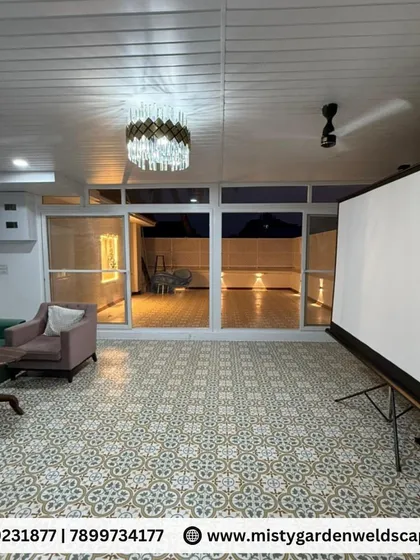 We converted this open terrace at Skylark Greens into a luxurious, fully enclosed room. Featuring a durable PUF sheet pergola, elegant PVC ceiling, and large UPVC sliding doors, this space is now a perfect, comfortable retreat for relaxation and entertainment, protected from the elements.