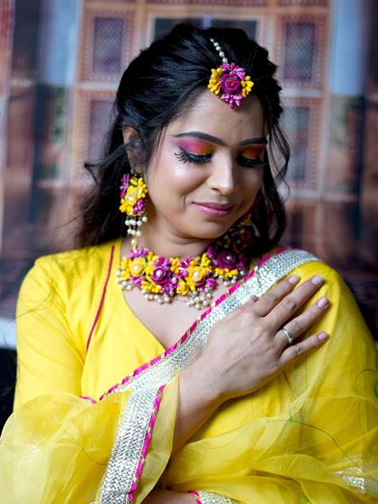 A serene and graceful pose, capturing the beauty of the Haldi bride.
