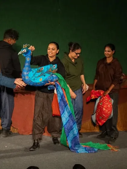 After a performance of 'Be Yourself', we love to showcase the incredible craftsmanship of the puppets. Here, our founder introduces a stunning peacock puppet, its tail made from a colourful Leheriya textile, connecting the art of puppetry with India's rich craft heritage.