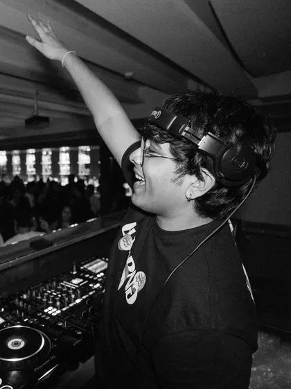 A candid shot of me enjoying the moment at Escobar, Mumbai. I'm happiest when I'm behind the decks, connecting with the crowd.