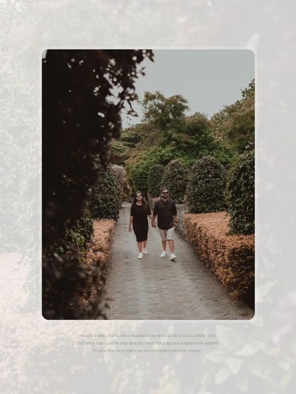 A framed shot of the couple walking down a long, tree-lined path, creating a sense of journey.