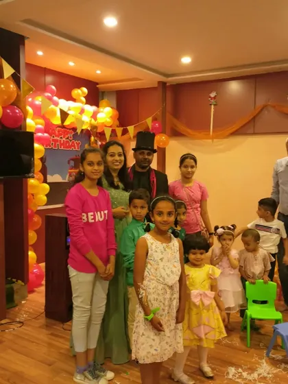 A lovely family photo after a birthday party performance. I am happy to pose with the birthday child and their family to capture the memory.