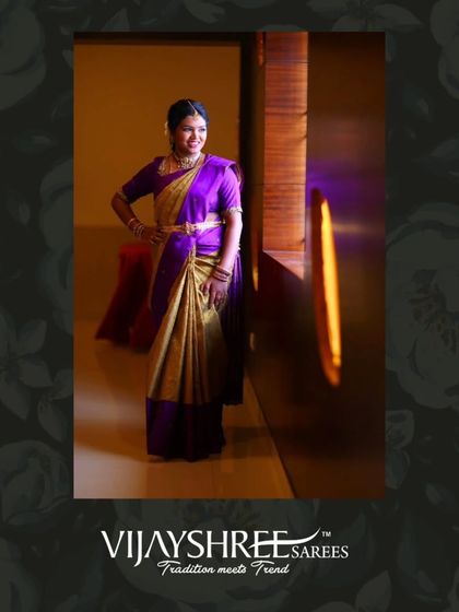 Jhanavi looks stunning in a purple and gold Kanjivaram, a classic combination for any grand occasion.