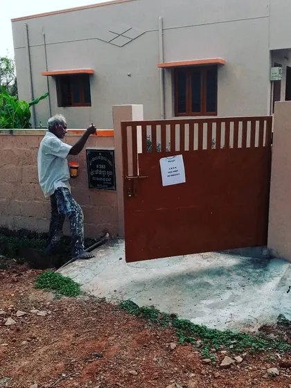 Here I am finishing up a project. I believe in doing the work myself to ensure quality, whether it's painting a metal gate to protect it from the weather or refreshing the entire exterior of your house.