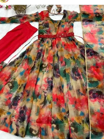 A vibrant, multi-color floral printed Anarkali suit fabric. We can turn this beautiful material into a stunning, perfectly fitted dress for you.