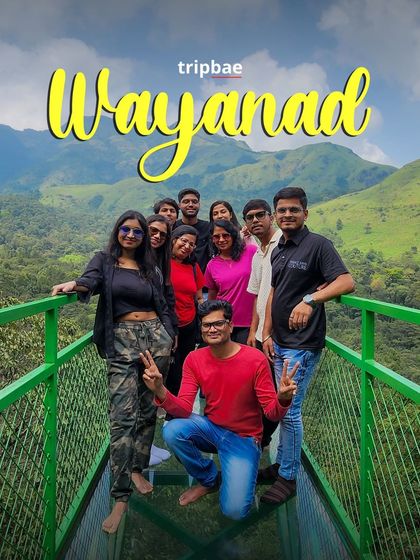 A great group shot on the Wayanad glass bridge, with the stunning valley in the background.