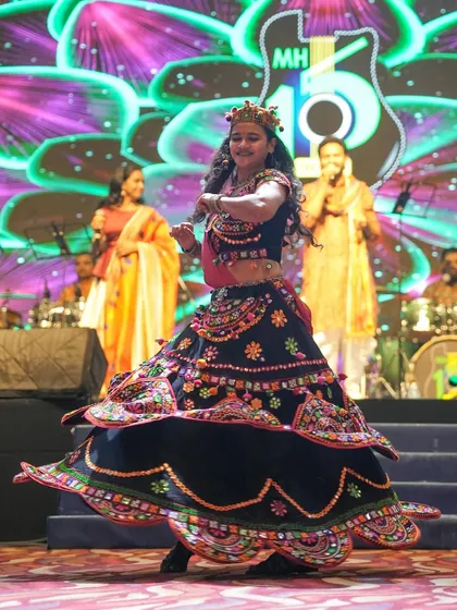 The twirl of a traditional chaniya choli is an essential part of any Navratri performance. Here I am, dancing on stage during a corporate Navratri night.