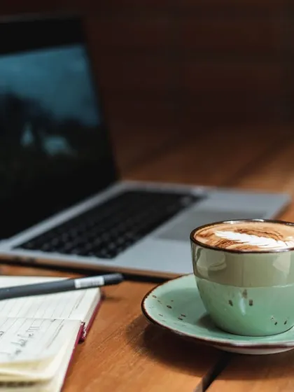 A quiet moment with a cappuccino and a laptop. Our cafes are a great place to work, relax, or catch up.