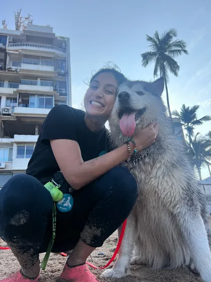 Getting sandy and getting smiles. There's nothing like a happy, tired dog after a morning of fun at the beach. I love getting down to their level and sharing in their joy.