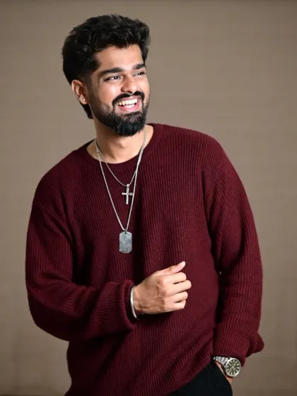 A relaxed and happy portrait. This shot captures a natural smile, making it perfect for a professional headshot or a casual profile picture.