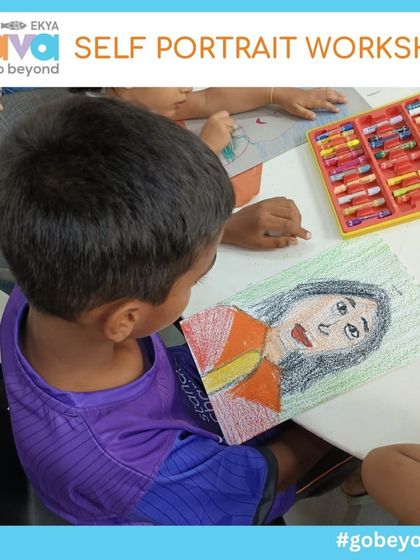 A young boy carefully adds color to his self-portrait drawing. My workshops provide a supportive space for children to focus, develop their artistic skills, and gain confidence in their creative abilities.