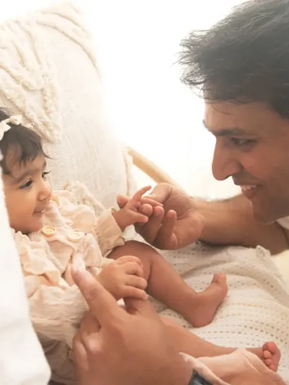 Another beautiful father-daughter moment. The way they look at each other is so full of connection and joy. These are the unposed, authentic moments I strive for.