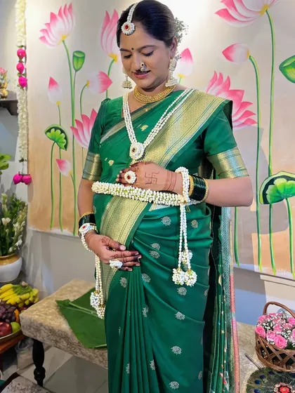 Celebrating a new beginning with a comfortable and beautiful baby shower drape. I focus on creating a secure yet gentle fit for mothers-to-be, using techniques that ensure the saree stays in place while allowing for easy movement.