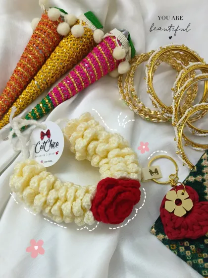 For your most special days, we create these beautiful handmade crochet gajras. Unlike fresh flowers, they last forever, becoming a timeless keepsake from your wedding or Mehendi ceremony.