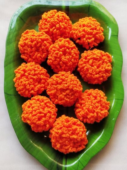 The response to my crochet flowers has been wonderful. Here are some orange marigolds, perfect for Gudi Padwa decorations.