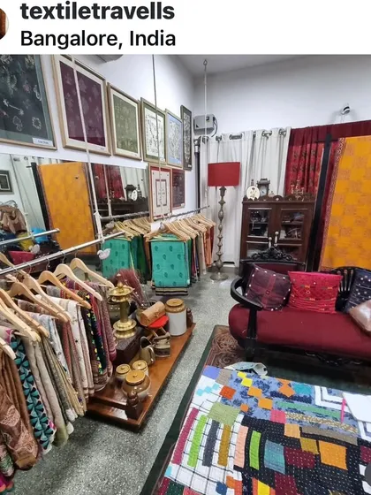 My studio is a treasure trove of textiles and inspiration. Racks of finished sarees, antique furniture, and walls adorned with my work create a warm and creative atmosphere.
