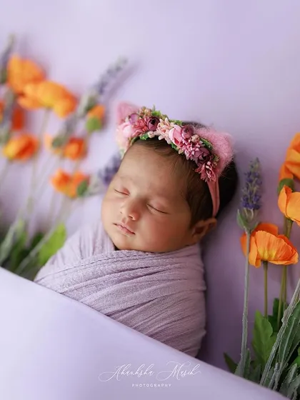 A duplicate image, this shot of a newborn among flowers continues to highlight the dreamy and imaginative portraits I love to create.