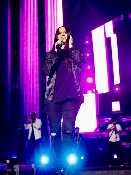 A full-stage view of Lana Rose, with the background screen and lighting creating a rich, purple-hued atmosphere. This shows my ability to capture the entire visual experience of a concert.