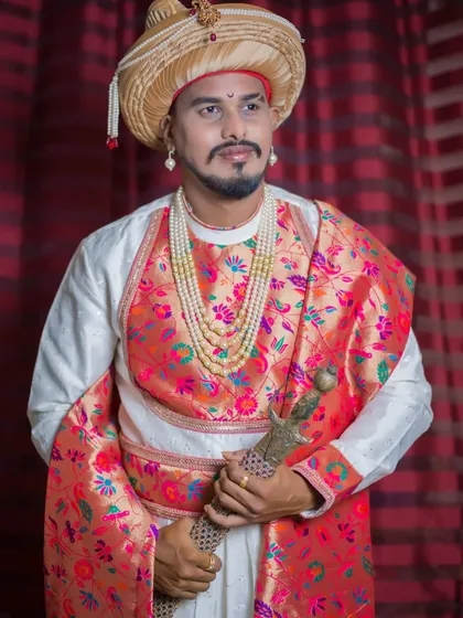 Another powerful portrait of the groom in his historical-themed attire, looking confident and majestic.