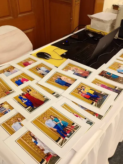As part of the experience, I can arrange for instant photo printing. Guests can take home a printed family portrait from the party as a beautiful souvenir.