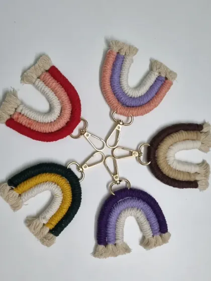 A circle of handmade rainbow keychains, each one a little burst of color and joy. These are one of the most popular items students learn to make and sell. They are perfect for birthday return gifts, bag charms, or simply to brighten up your keys.