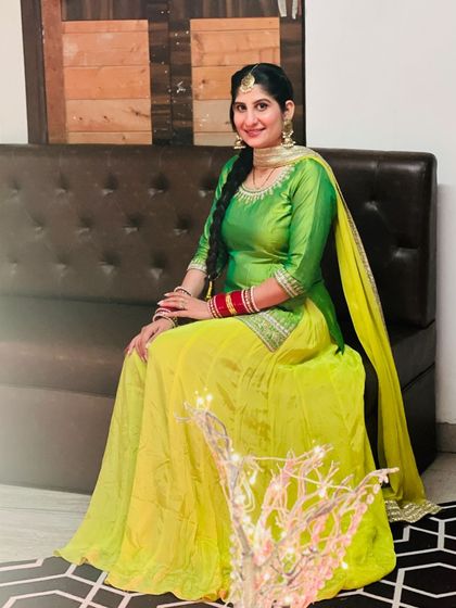 Another beautiful shot of our client enjoying her event in this colorful traditional outfit. Renting lets you embrace every theme without a second thought.