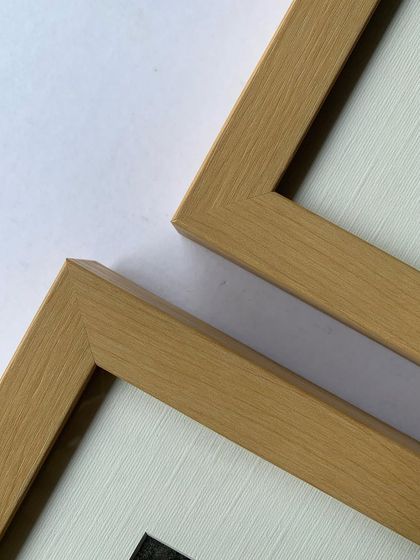 A close-up of the corner of our maple frame, showing its clean lines and smooth finish.