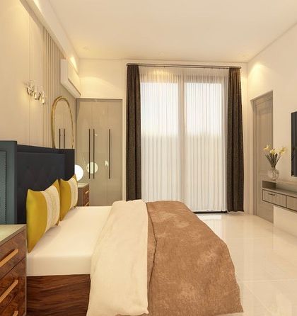 This angle shows the TV unit and the overall layout of the spacious bedroom design.